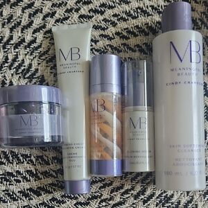 Meaningful Beauty Skincare Collection with Purple and Cream Accents